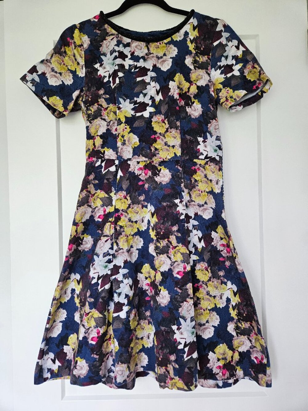 Floral dress with embellished neckline